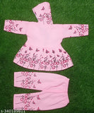 Pink flowered fabric set with matching jacket and skirt