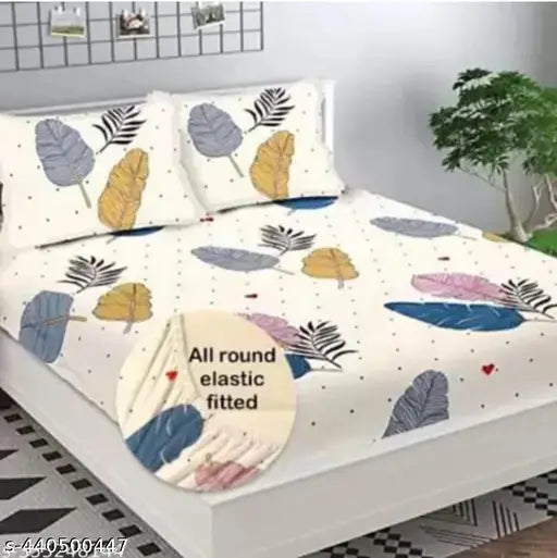 Super fine, botanical-patterned glace cotton fitted bedsheets in double queen size. Two pillow covers included, ideal for mild winter use. Made in India