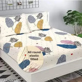 Super fine, botanical-patterned glace cotton fitted bedsheets in double queen size. Two pillow covers included, ideal for mild winter use. Made in India