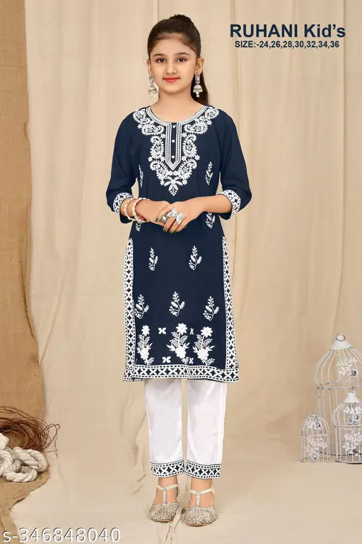 Rayon embroidered kurta pant set for girls, three-quarter sleeves, rayon fabric on display rack
