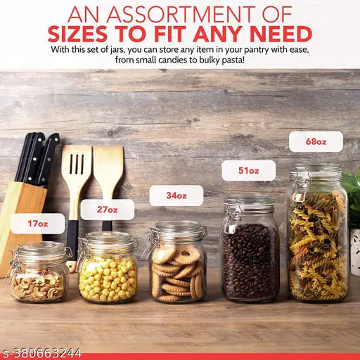 An assortment of glass air tight containers, with sizes from small to bulky, stored in clear plastic airtight fridge storage containers