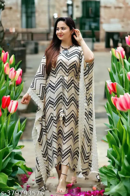 Kaftan kurta with lace detail, long sleeves, and flared skirt