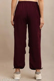 The image depicts a pair of women's elastic waist burgundy cargo pants