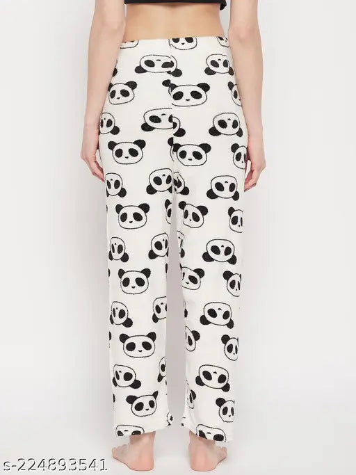 Female model wearing camo patterned pants and black tank top, showcasing winter woolen soft fleece lower track pants with a high-waist design
