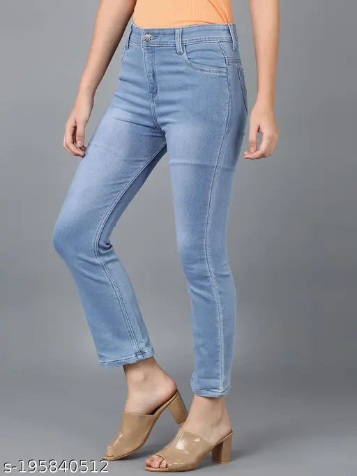 Orange cropped top, light blue high stretch jeans