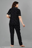 Women's rayon printed black nightsuits set with short sleeves, featuring a shirt top and pyjama bottoms in various sizes: M, XL, XXL, XXXL. Indian-origin nightwear on hanger