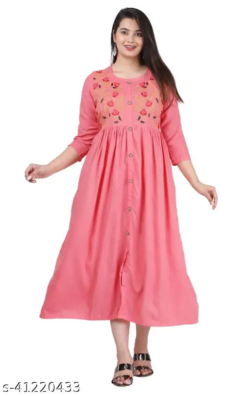 Peach rayon embroidered kurti with three-quarter sleeves, trendy women's fashion from India