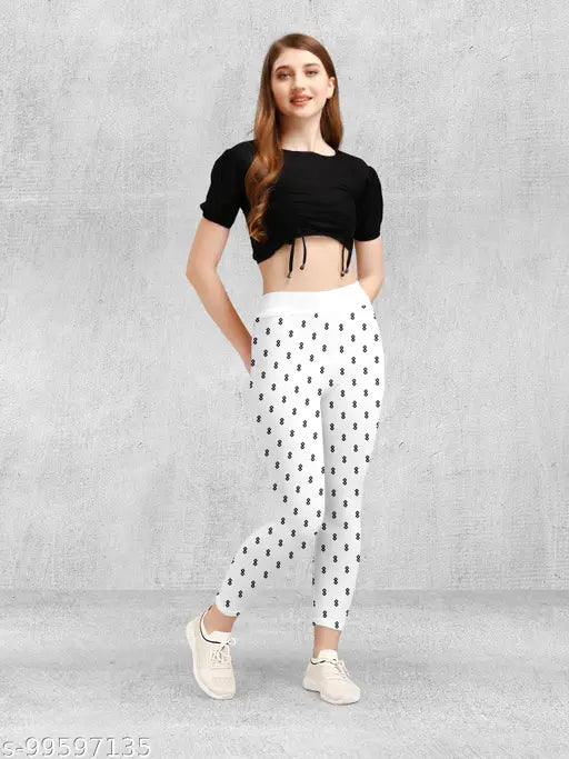 Cotton blend printed jeggings for women and girls - high rise, slim fit, pack of 2. Ankle length, dry clean only. Includes sizes 26-34 (waist 28in-36in, length 35in). Indian origin