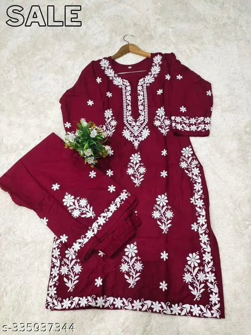 Rayon embroidered net kurta set with palazzos, three-quarter sleeves, and various sizes available