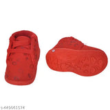 Red and black casual shoes with a cartoonish design, suitable for young children