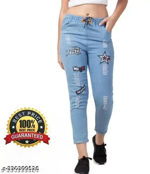 Ladies casual blue distressed jeans with white star details, cuffed ankles, front pockets