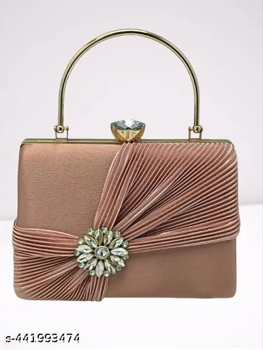 Pink velvet bridal clutch with embellished detailing, suitable for weddings and formal events