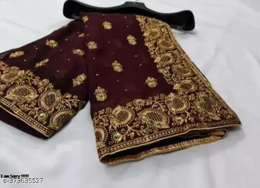 Gold embroidered full saree with paisley patterns