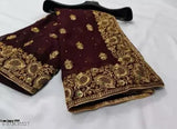 Gold embroidered full saree with paisley patterns