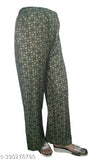 Printed flowery pants with a hemline that is slightly different on each side, resembling a riyon style