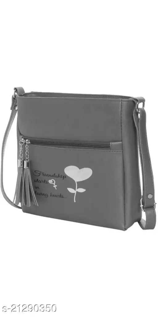 Fashionable women's crossbody bag with black strap and heart detail, suitable for carrying everyday essentials
