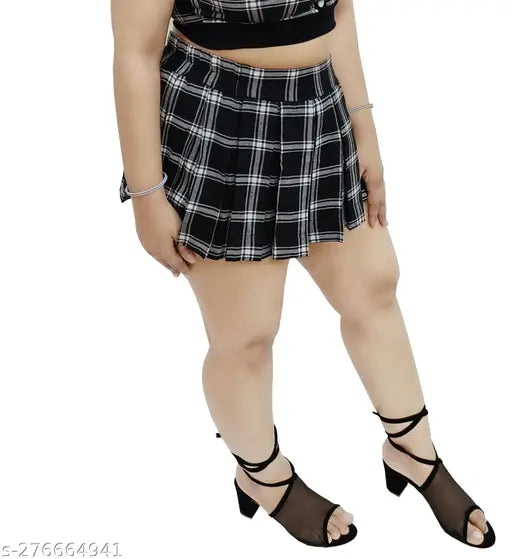 Black cotton twill checked mini skirt, flattering skater style for girls and ladies casual wear, sports wear, Korean influence. Soft and comfortable pleated design made with pure cotton fabric. Available in sizes 24-34, suitable for outdoor wear, parties, or birthday events. Can be paired with leggings for added style and elegance. Origin: India