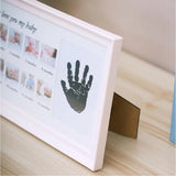 Multi-colored acrylic baby handprints & footprints frame for 12-month milestone photos, decorative keepsake