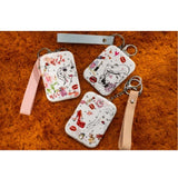 Multicolor metal rectangle pocket mirror with chic illustrations, perfect for daily essentials and stylish carry-all