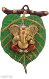 Metal Ganesh idol, Fashion Bizz religious icon, Indian Ganesha figure on leaf