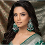 Multicolor zinc alloy gold-plated chandbali earrings on display, avoid contact with water, perfume, and harsh chemicals