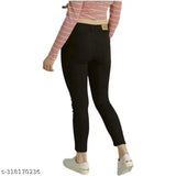 Black polyester women's skinny mid-rise jeans, comfortable single button stretchable design for casual wear. Size: 28, 30, or 32 inches. Made in India