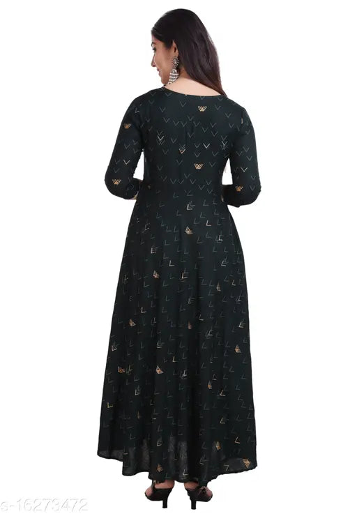 Green Rayon Anarkali with Potli Gold W Print, three-quarter sleeves, available in S, M, L, XL, XXL. Indian traditional women's fashion on model
