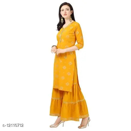 Yellow crepe kurta set for women, long sleeves, ruffled hem, matching sharara