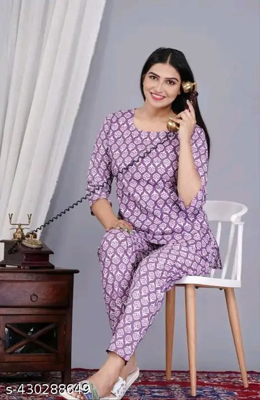 Purple cotton printed women's night suit top and pyjama coord set, three-quarter sleeves, vibrant floral pattern