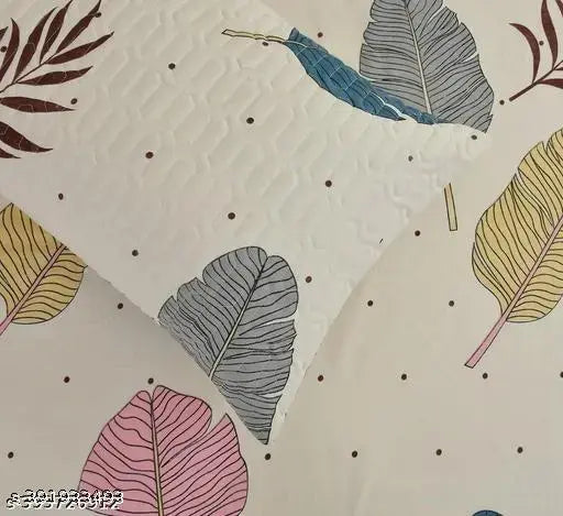 Multicolor floral superfine cotton flat sheets set, includes 1 double bedsheet, 2 quilted cushion covers, 2 pillow covers & 2 fillers. Handcrafted in India for summer use