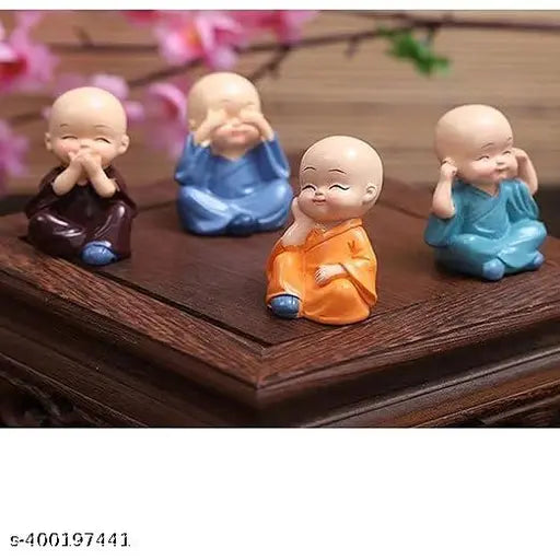 Resin monk figurine set, 4 pieces for home decoration, intricate Indian craftsmanship