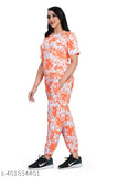 Orange cotton-blend co-ords set, featuring a printed t-shirt and relaxed-fit trousers. Ethnic straight-fit design with a touch of lycra for comfort and style. Perfect for traditional looks in any season. Indian origin