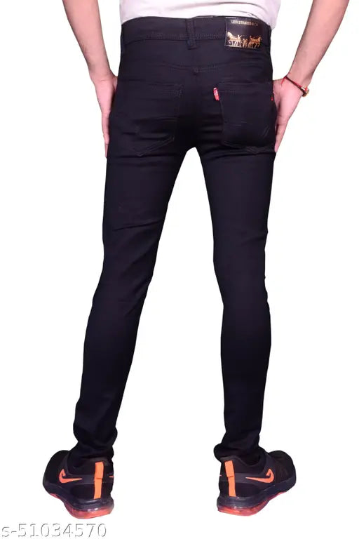 Stylish men's black denim jeans for party and casual use. Comfortable stretch fabric, solid pattern, ideal for sizes 28, 30, 32, 34. Indian-made men's denim jeans for style