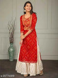 Red and gold women's kurta set with embroidery