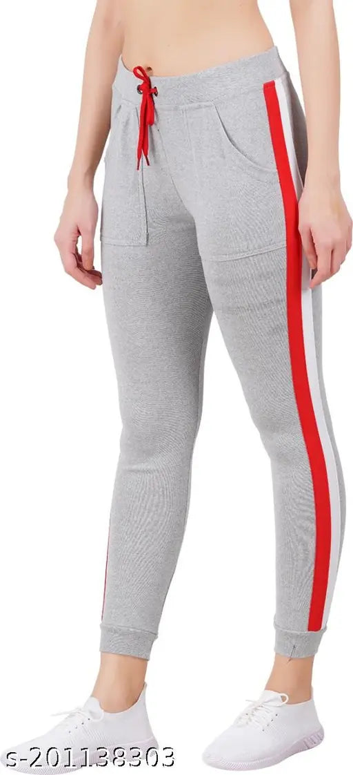 Striped cotton blend pocket joggers for girls, soft, comfortable, stretchable, suitable for sports and yoga. Available in four colors: 28 (waist 28, length 36, hip 32), 30 (waist 30, length 36, hip 34), 32 (waist 32, length 36, hip 36). Made in India