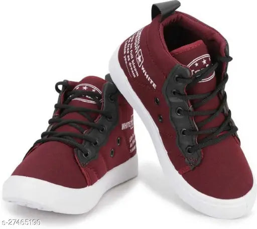 A pair of red and black boys' casual high-top sneakers with laces, featuring a unique funky design
