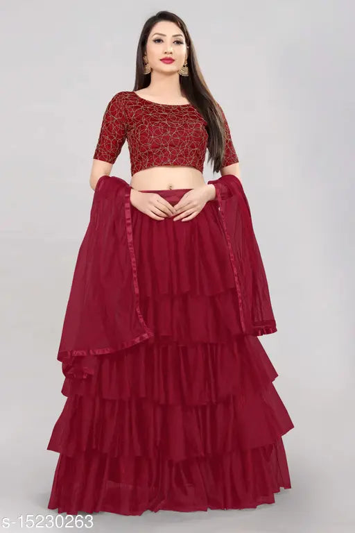 Silk and net unstitched Lehenga choli with embroidered top and ruffled bottom, lace dupatta. Indian bridal wear on mannequin" (106 characters)