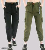 Two pairs of cargo pants, one dark, one olive green, with pockets and drawstrings, styled on a mannequin