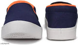 Blue, orange, navy sports shoes with white soles