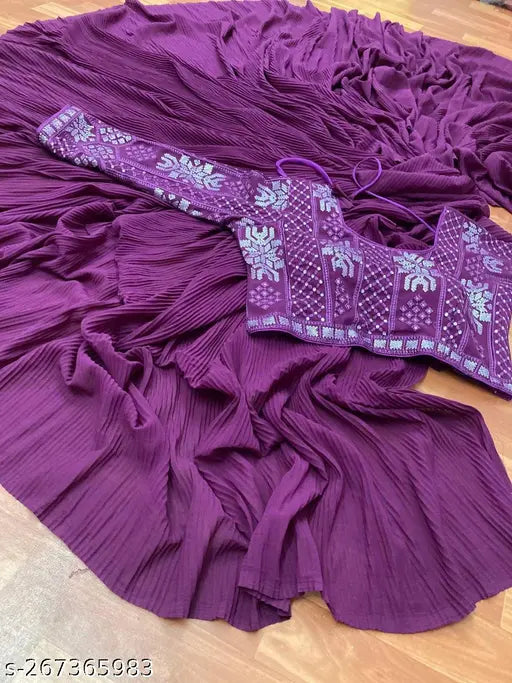 Purple saree with pleats and crush work blouse