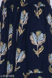 The image depicts a navy skirt with a floral pattern on a person who is not directly identifiable. It has an elastic waistband and appears to be made of a solid fabric material, possibly cotton or chiffon