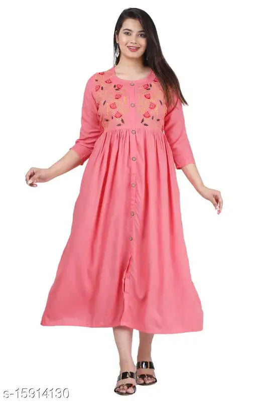 Peach embroidered rayon kurti, three-quarter sleeves, trendy Indian fashion
