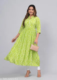 Green rayon printed Gaither Anarkali kurti set with pum-pom detail, three-quarter sleeves, includes short kurti and dupatta. Indian fashion for women's party wear