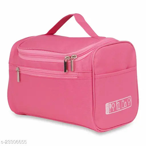 Pink fabric net pouch for travel and organization, ideal for toiletries or cosmetics. Made in India