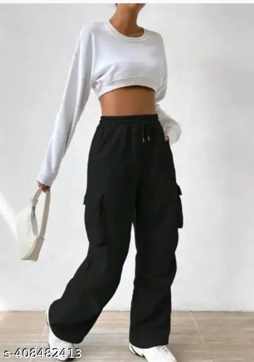 Black cargo pants with two side pockets, long sleeves, cropped cut, black fabric