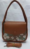 New trendy sling bag with brown leather and floral pattern
