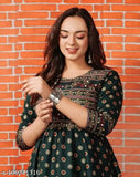 Dark green printed rayon Anarkali kurta for women, suitable for daily wear and events. High-quality, comfortable 100% rayon fabric
