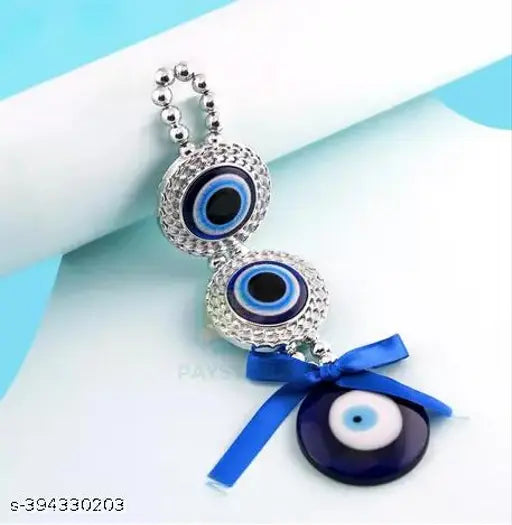 Blue Turkish Evil Eye oval amulet for home decor and car protection, handmade in India