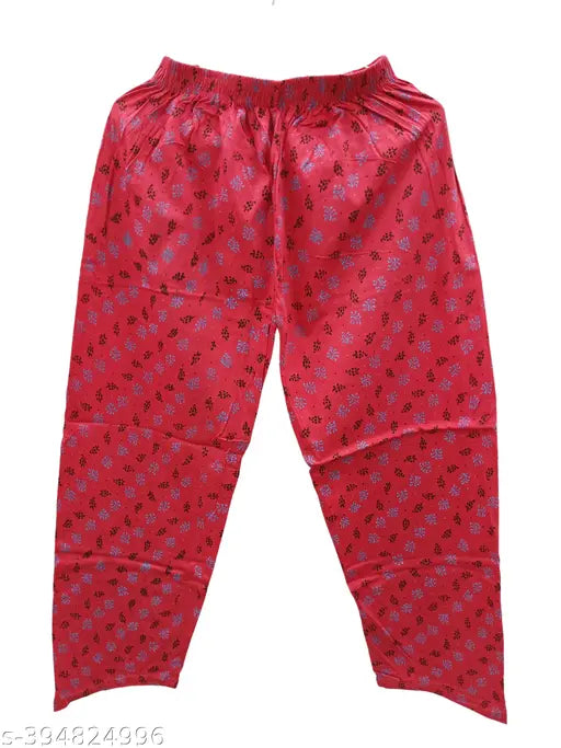 Red and green printed women's track pants with lower cut, soft cotton material