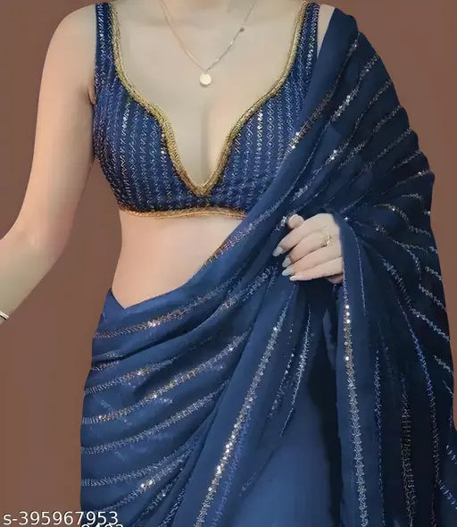 A beautiful blue and gold sequined georgette saree with blouse piece